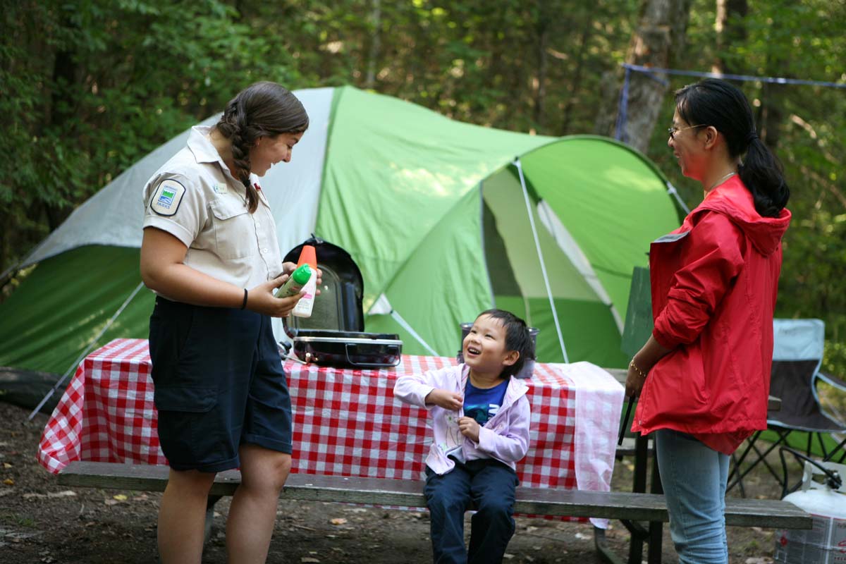 Talking to staff at a campsite